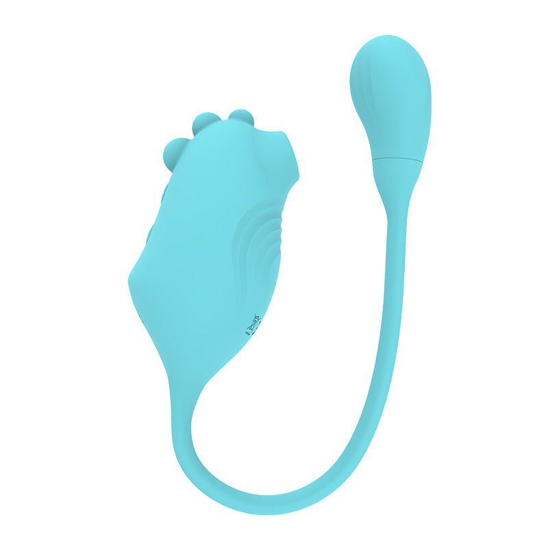 DinoTail - Mint green suction and vibration dual-action egg vibrator with flexible dinosaur tail design